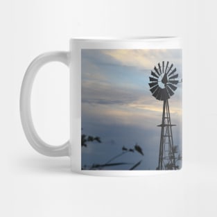 Windmill Sillouette with Gray, Blue Sky in Kansas Mug